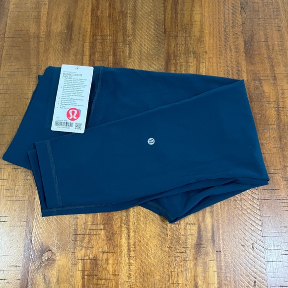 lululemon athletica Pants - High-Rise 25" INDOCHINE BLUE Lululemon Wunder Train Tight Size 14